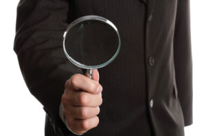 private investigator magnifying glass